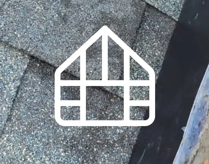 A close-up view of textured gray roofing shingles with a white house icon overlaying the image.